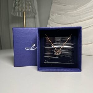 SWAROVSKI Dazzling Dual Sided Swan Black and Rose Gold Necklace